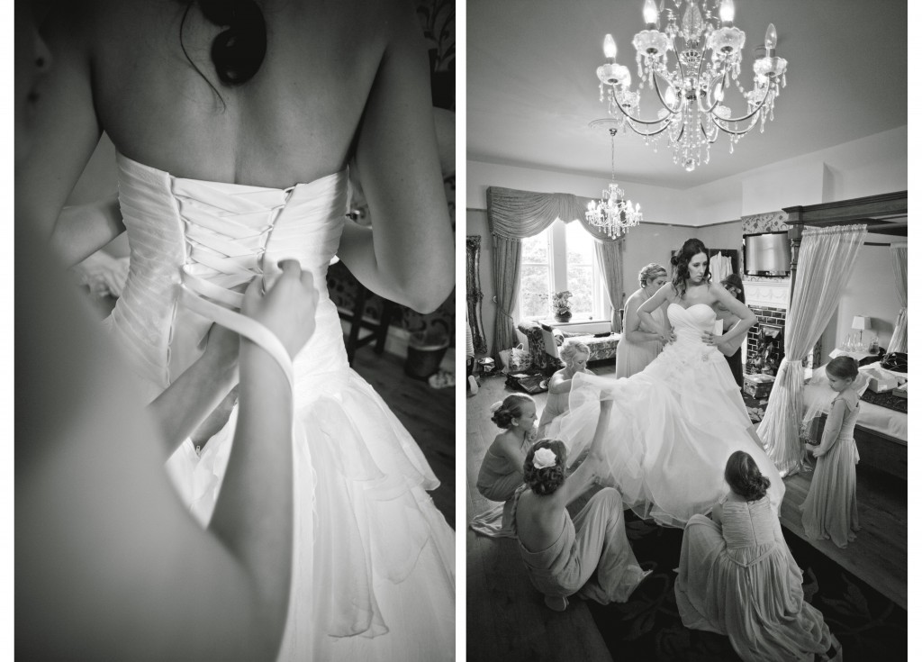 A bride getting into her wedding dress at West Tower, Lancashire Wedding Photography
