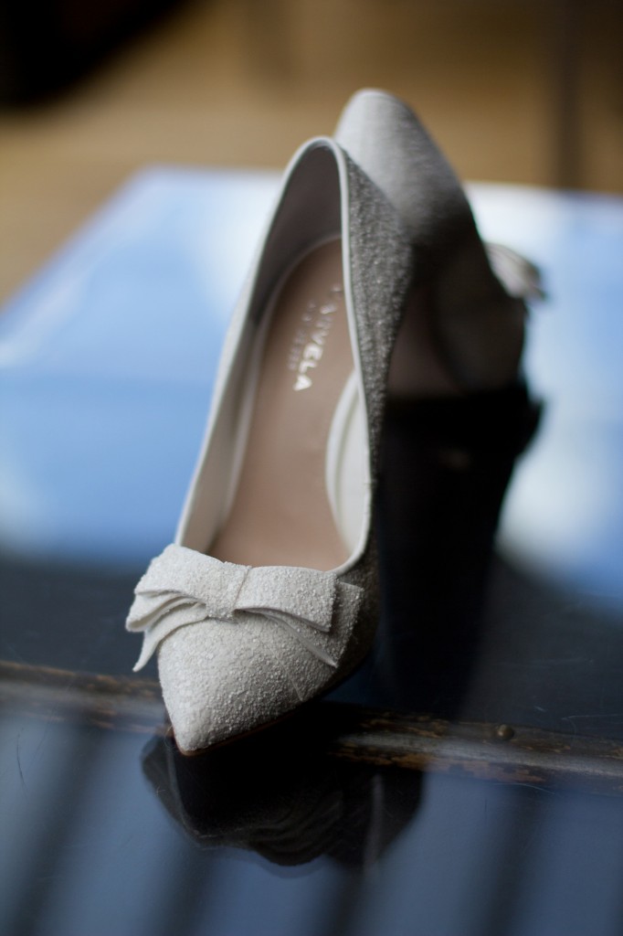 A second detailed wedding photograph of wedding shoes