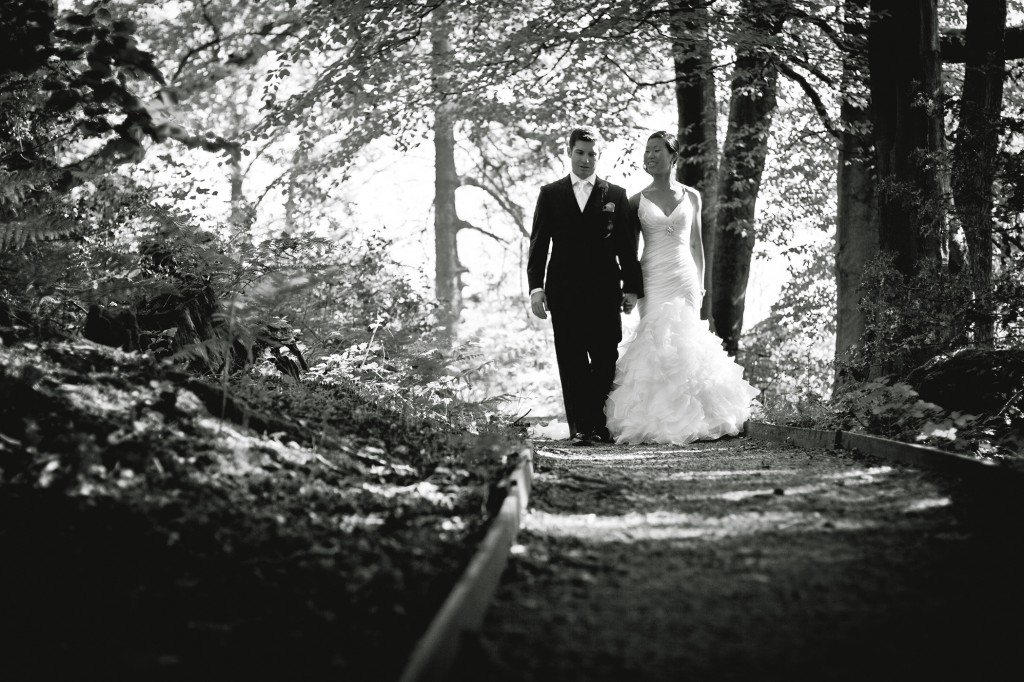 Walking through the woods of the grounds of the stunning wedding venue Linthwaite House, Cumbria