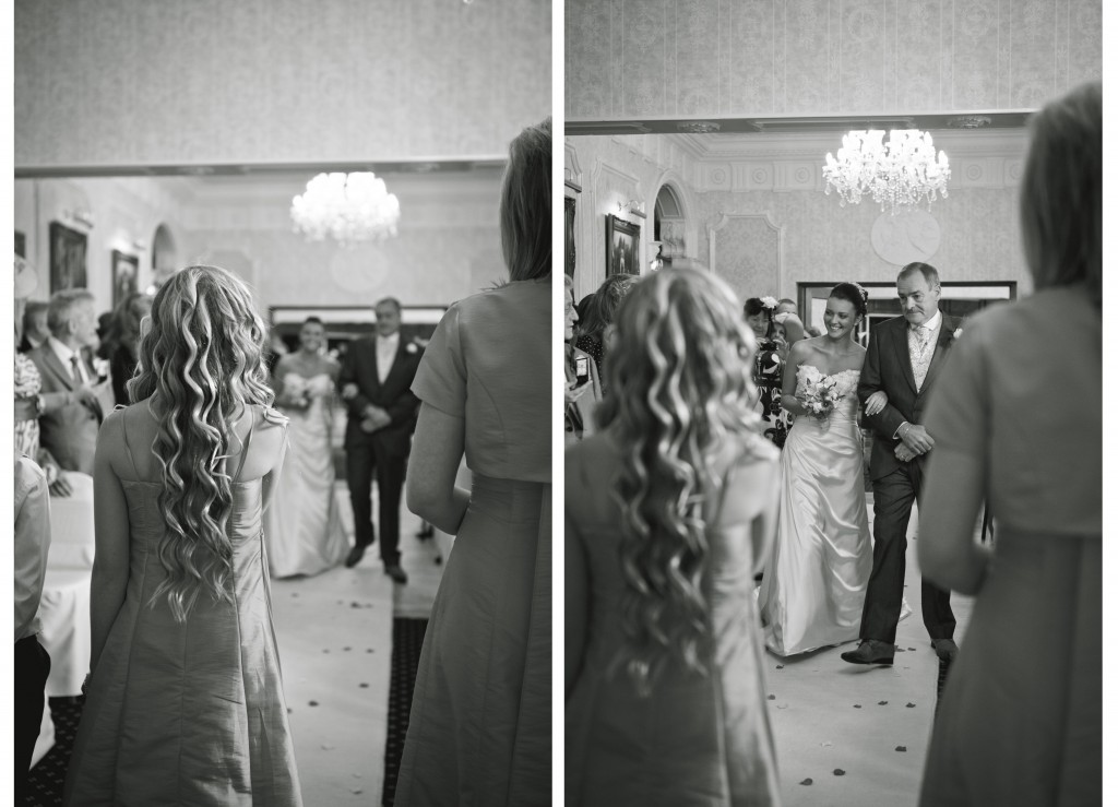 Walking down the aisle with her father at the Country House Hotel