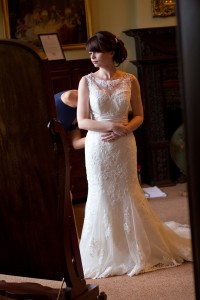 Bride standing in bridal suite of Rowton Castle, Shropshire Wedding Photography
