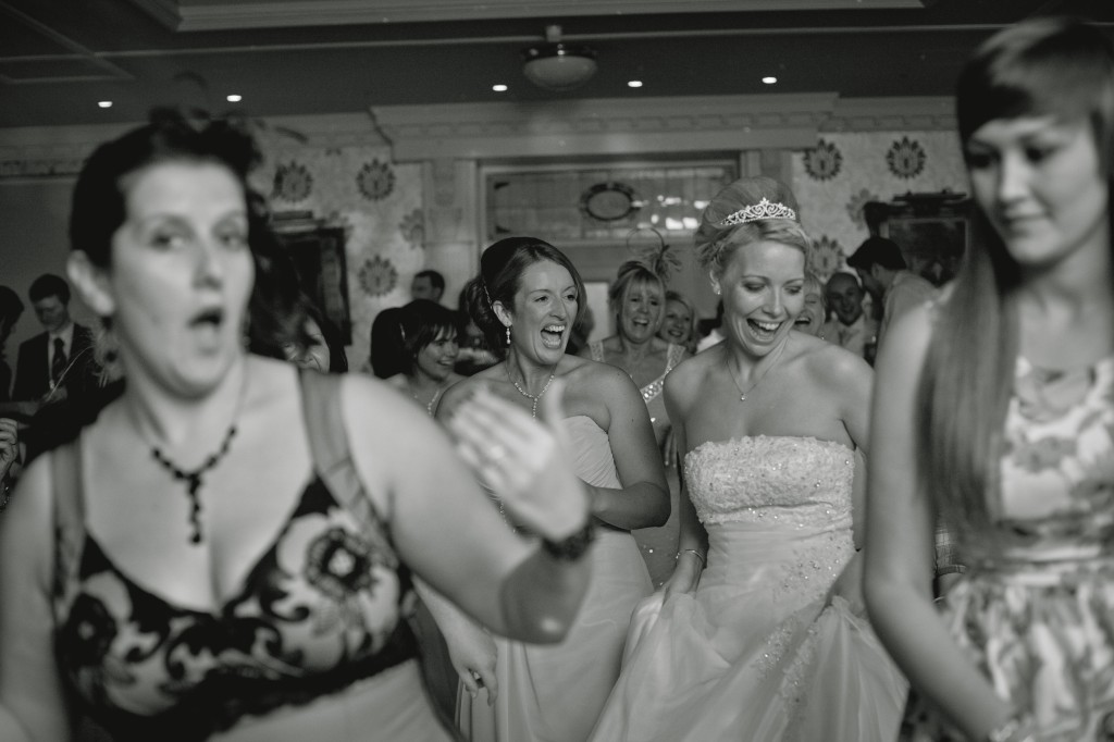 Zumba dancing at a wedding reception in Ashfield House Hotel, beautiful professional wedding photography Wigan