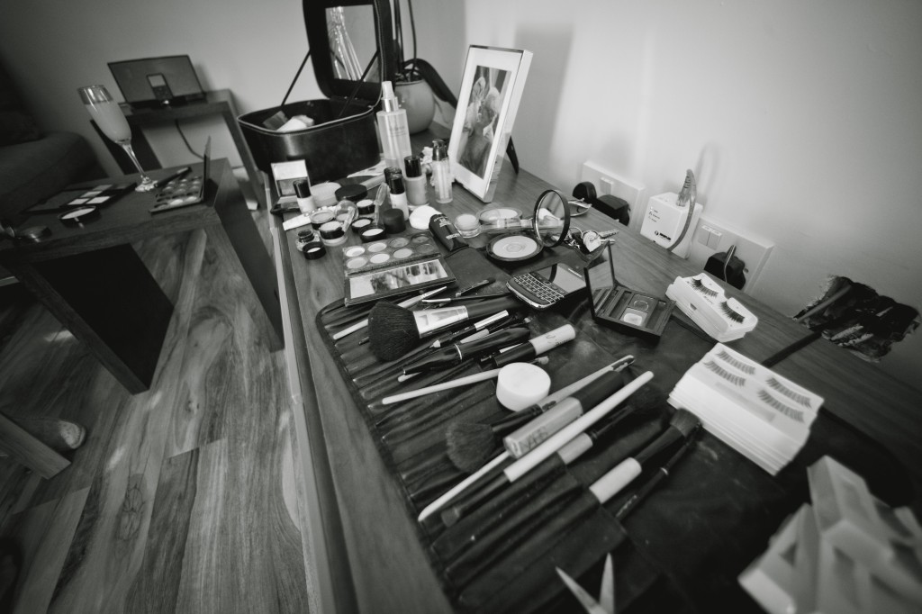 Wedding photojournalism, a wedding photograph of the make-up mess during bridal preparations
