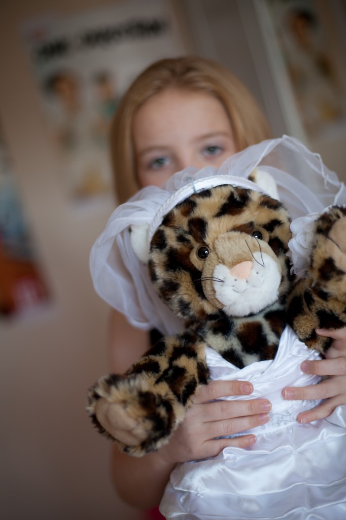 Bridesmaid and her bride cuddly toy. Creative Wedding Photography, Lancashire