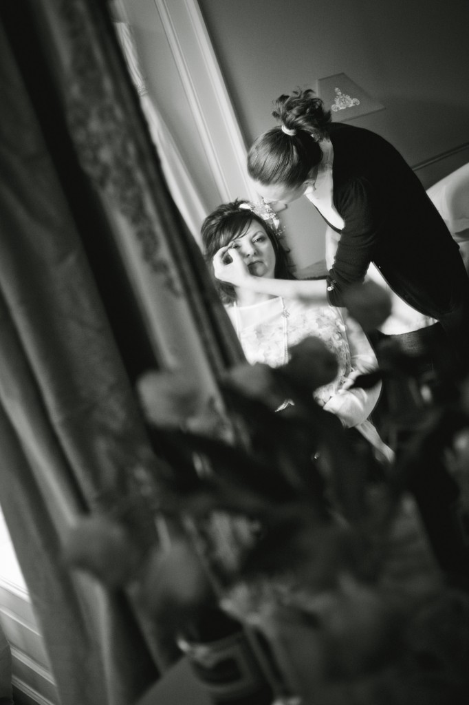 Creative mirror wedding photograph of bridal preparations