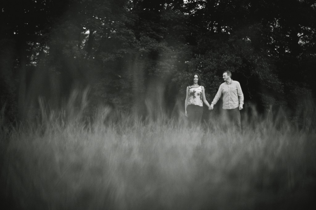 Couple Holding Hands in Lancaster Field | Creative Pre Wedding Photography
