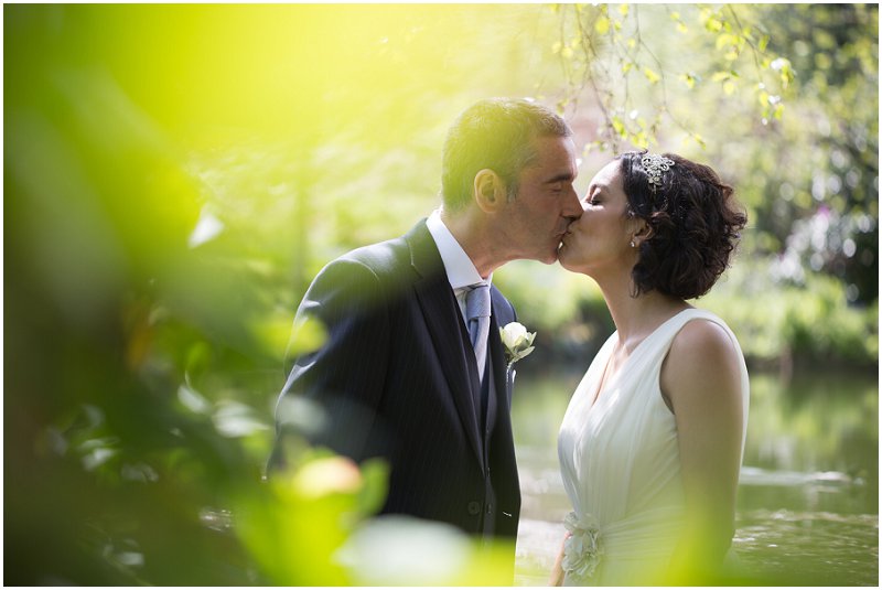Couple kissing at Linthwaite House Hotel wedding