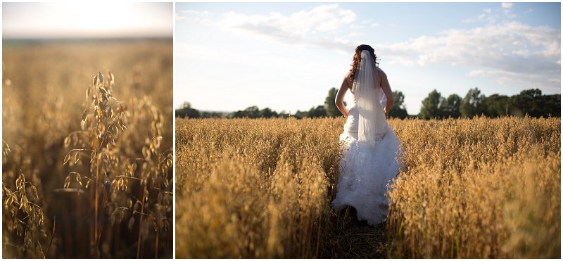 Bride walking through fields at West Tower Wedding Photography