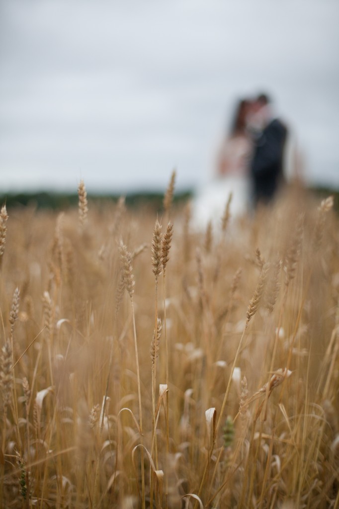 Bride and groom in a field, Creative Modern Wedding Photography