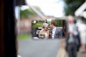 Creative Wedding Photography, Bride and Groom in Car Mirror.