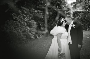 Bride and groom portraits, creative wedding photography shooting through trees