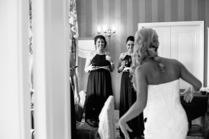 Bridesmaids see Bride first time with dress on