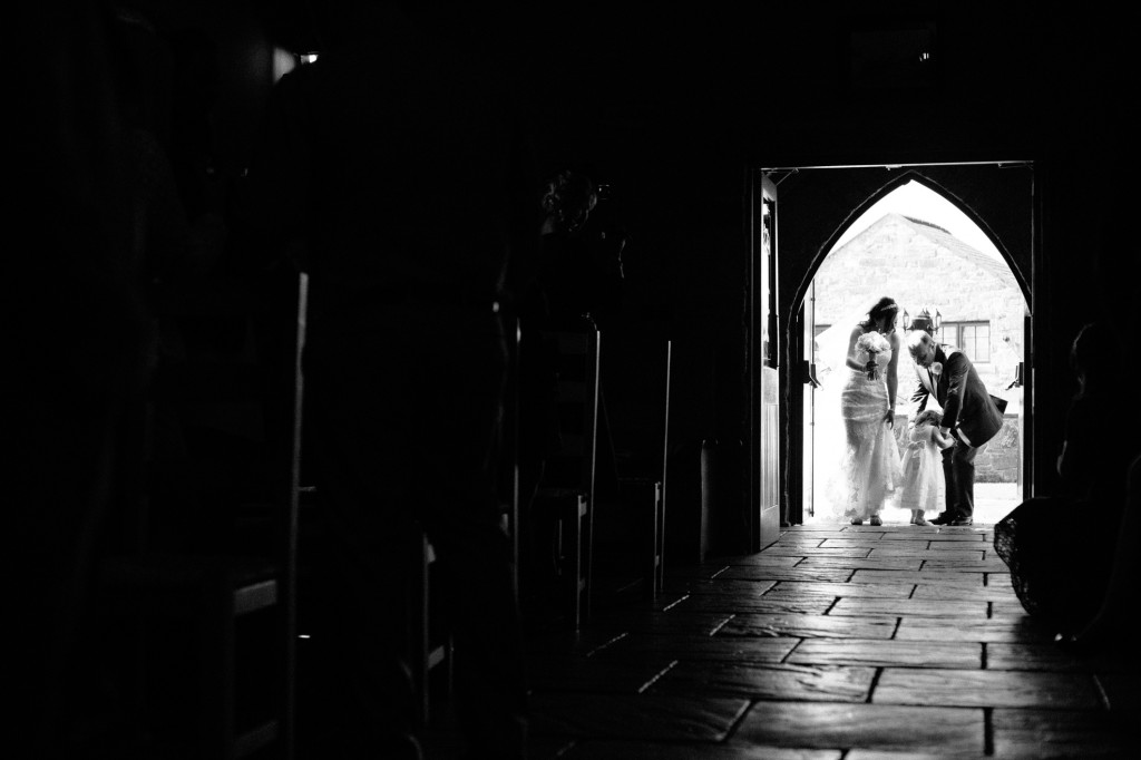 Bride about to walk through door 
